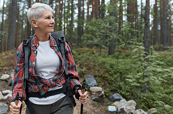 Woman Hiking in a Forest